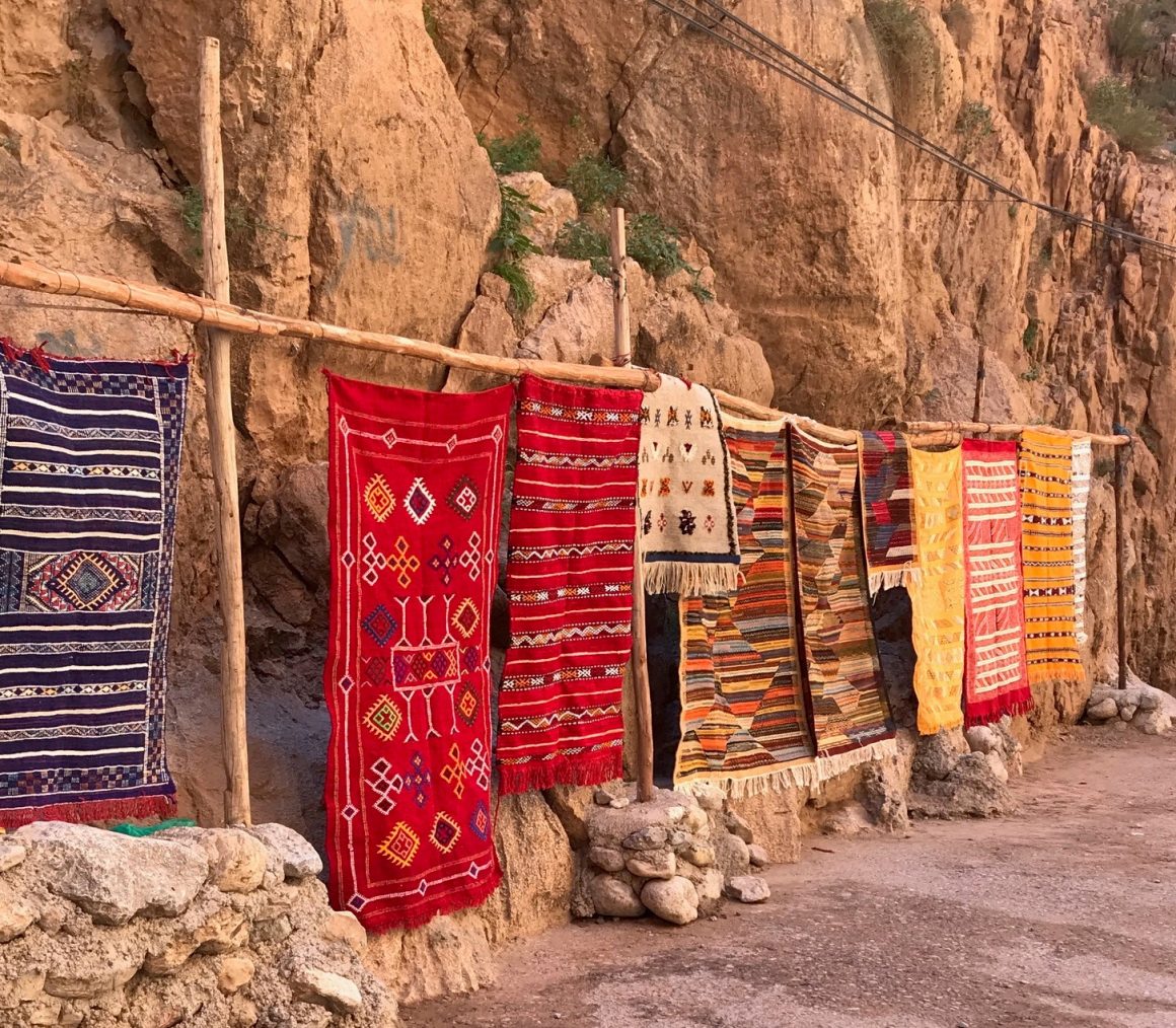 Berber carpets Todgha Gorge high atlas mountains morocco artisans ancient craft colour roadside skelly
